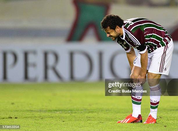 Fred of Fluminense gets hurt during the match between Fluminense and Internacional a as part of Brazilian Championship 2013 at Moacyrzao Stadium on...