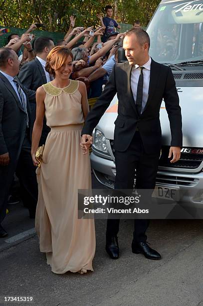 Anna Ortiz and Andres Iniesta arrive to the wedding of Xavi Hernandez and Nuria Cunillera at the Marimurtra Botanical Gardens on July 13, 2013 in...