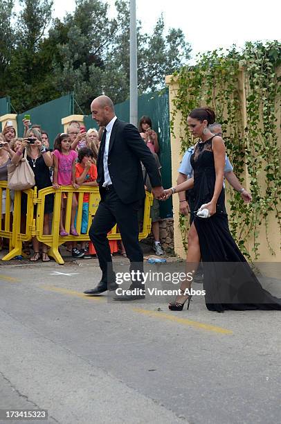 Pep Reina and Yolanda Ruiz arrive to the wedding of Xavi Hernandez and Nuria Cunillera at the Marimurtra Botanical Gardens on July 13, 2013 in...