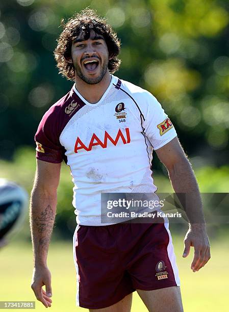 Johnathan Thurston has a laugh during the Queensland Maroons State of Origin training session on July 14, 2013 in Sunshine Coast, Australia.