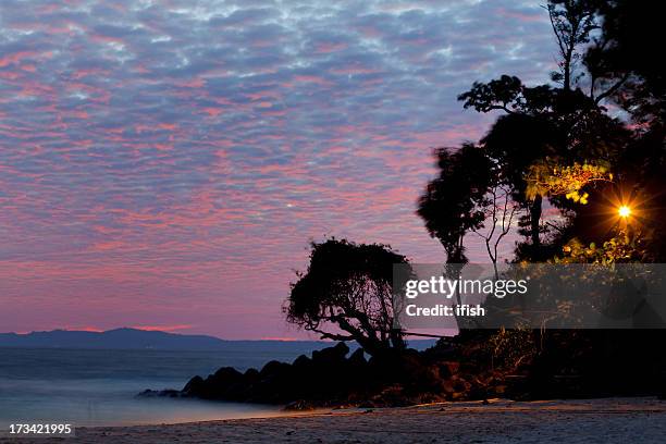 windy day at dusk, beach of bangka island, north sulawesi - sulawesi stock pictures, royalty-free photos & images