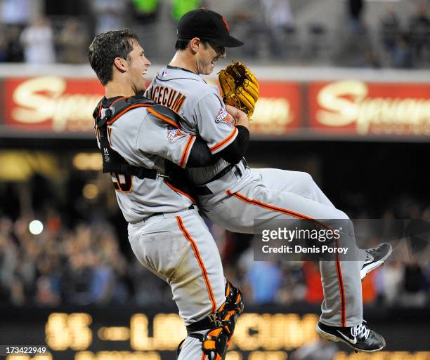 Tim Lincecum of the San Francisco Giants is lifted by Buster Posey after pitching a no-hitter during a baseball game against the San Diego Padres at...