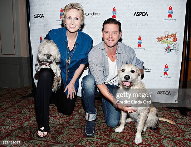 Actors Jane Lynch, Clarke Thorell and Sandy attend the Broadway Barks 15th Animal Adoption Event at Shubert Alley on July 13, 2013 in New York City.