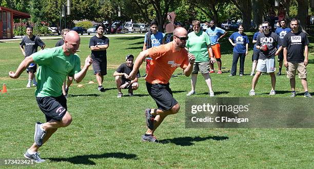 Teams race to decide winner of Duck Duck Goose competition during the Founder Institute's Silicon Valley Sports League event on July 13, 2013 in Palo...