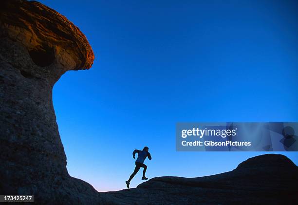 trail runner girl - alberta badlands stock pictures, royalty-free photos & images