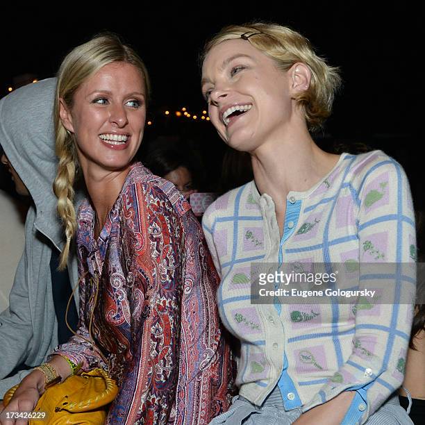 Fashion darlings, Jessica Stam and Nicky Hilton, cozy up to each other during Samsung's Summer DJ Series to launch the Giga Sound system at Surf...
