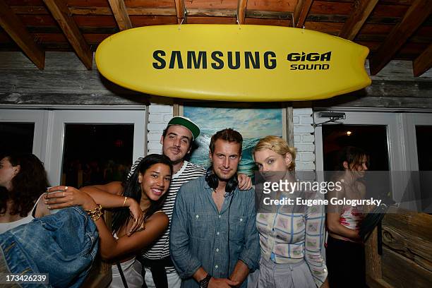 Hannah Bronfman and beau, Brendan Fallis, in the DJ booth showing model, Jessica Stam, the ropes on Samsung's brand new Giga Sound system at Surf...