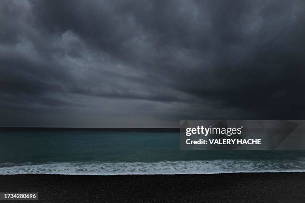This photograph taken on October 19, 2023 shows clouds over the Mediterranean sea in the French riviera city of Nice, on October 19, 2023.