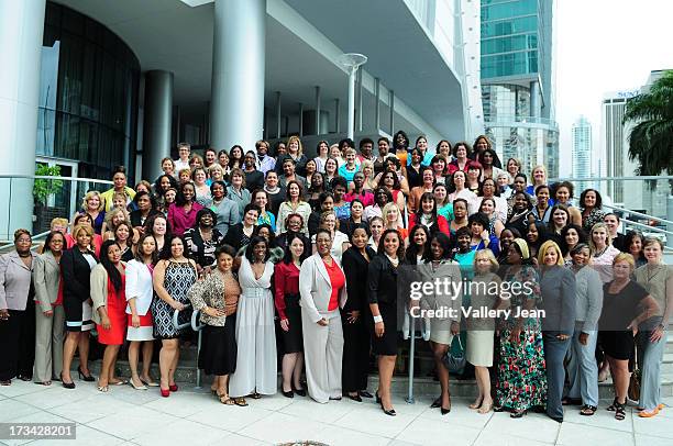 General view of a group portrait of Dress for Success Delegates From Around the World attend The 9th Annual Success Summit hosted by Dress For...