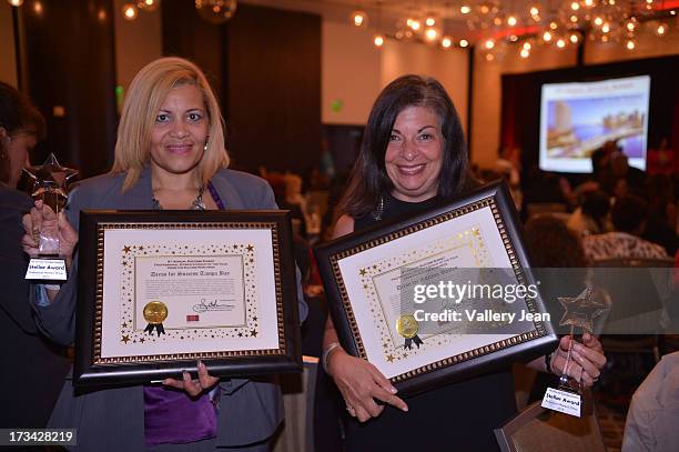 Lydia E. Pizarro and Shelley Crohn attend The 9th Annual Success Summit hosted by Dress For Success Worldwide at Epic Hotel on July 13, 2013 in...