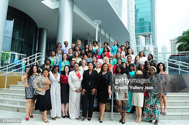 General view of a group portrait of Dress for Success Delegates From Around the World attend The 9th Annual Success Summit hosted by Dress For...