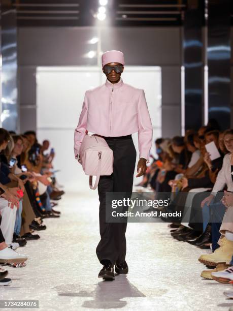 Models walk the runway wearing creations by designer Igor Dieryck during the fashion show of the 10 finalists of the 38th International Festival Of...