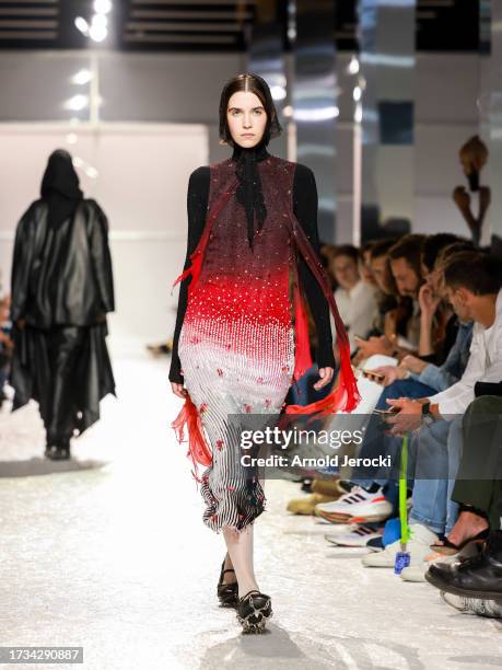 Models walk the runway wearing creations by designer Petra Fagerstrom during the fashion show of the 10 finalists of the 38th International Festival...