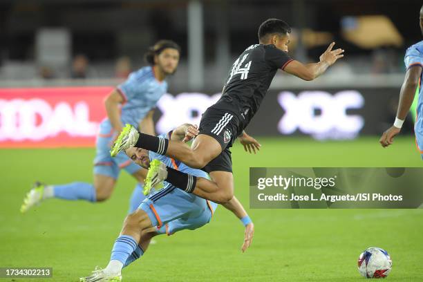 Andy Najar of D.C. United battles for the ball with Kevin O'Toole of New York City FC during a game between New York City FC and D.C. United at Audi...