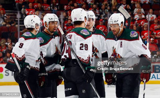 Matt Dumba of the Arizona Coyotes celebrates his first period goal against the New Jersey Devils at Prudential Center on October 13, 2023 in Newark,...