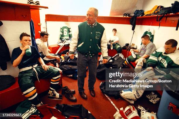 Snowden hockey coach Michael Moloney talks to his team after their victory over West Roxnbury at Mathews Areana .photo1