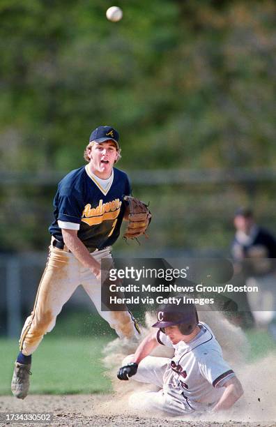 5/10/99. ANDOVER HIGH'S SS CHRIS JOHNSON THROWS TO FIRST AFTER COMPLETEING THE FRONT END OF A DOUBLE PLAY ATTEMPT. STAFF PHOTO BY MICHAEL SEAMANS...