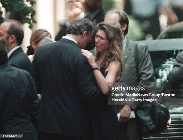 7/23/99-NY- EMOTIONAL COUPLE FOLLOWING MEMORIAL SERVICE FOR JFR JR. AT CHURCH OF ST. THOMAS MORE. STAFF PHOTO BY MIKE FEIN