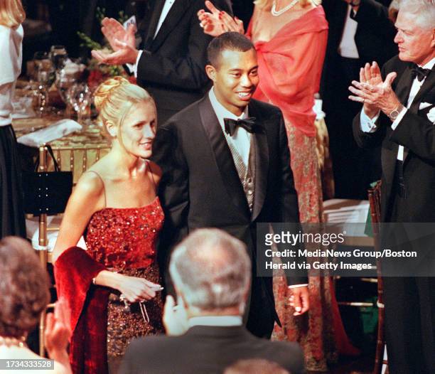 Tiger Woods and girlfriend receive applause as they enter Symphony Hall for the Ryder Cup Gala Dinner tonite Sept.22'99 also in phto6 Staff...
