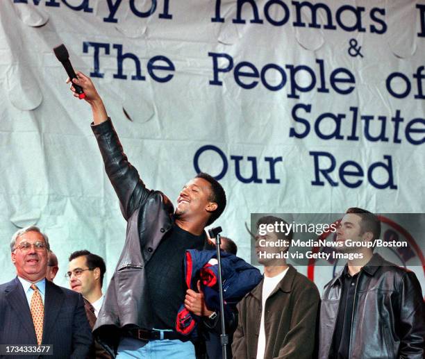 Mayor Thomas Menino, Dan Duquette, Nomar Garciaparra, and Framingham native and player Lou Merloni at City Hall Plaza in a small "Appreciation party"...