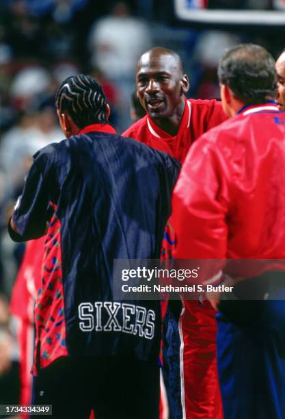 Michael Jordan of the Chicago Bulls greets Allen Iverson of the Philadelphia 76ers on April 17, 1998 at Comcast Center in Philadelphia, Pennsylvania....