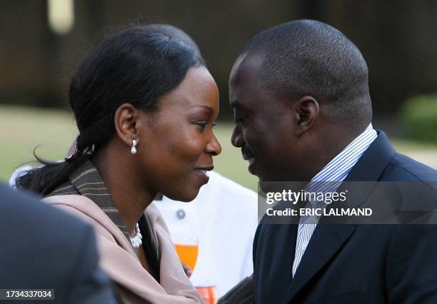 Democratic Republic of Congo President Joseph Kabila confers with Belgian State Secretary for Family Gisele Mandaila Malamba in the garden of his...