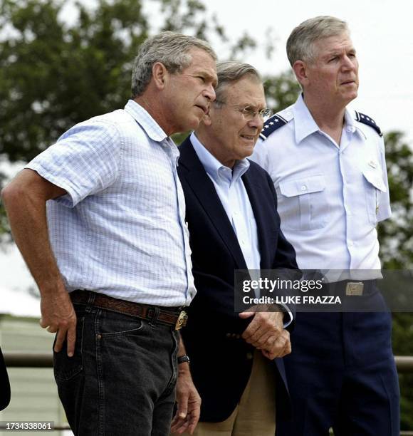 President George W. Bush , Secretary of Defense Donald Rumsfeld and Chairman of the Joint Chiefs of Staff Gen. Richard Myers meet with reporters 23...