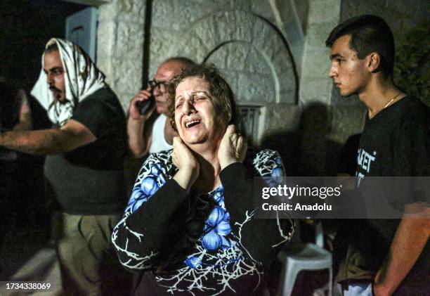 Woman cries at the Greek Orthodox Church after an Israeli attack in Gaza City, Gaza on October 20, 2023. At least two women have been killed and many...