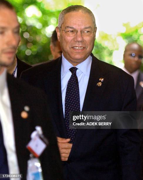 United States Secretary of State Colin Powell arrives at a hotel in Bangkok, 20 October 2003, prior to various bilaterial meetings. Leaders from the...
