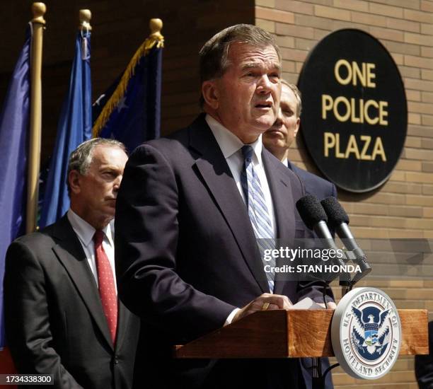 Department of Homeland Security Secretary Tom Ridge speaks to the media flanked by New York City Mayor Michael Bloomberg and New York State Gov....