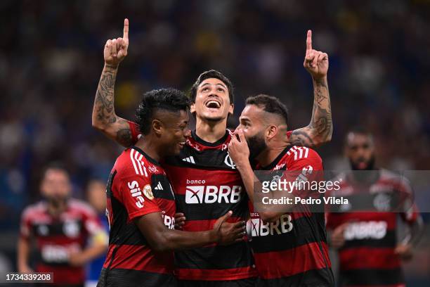 Pedro of Flamengo celebrates with teammate Bruno Henrique and Thiago Maia after scoring the team's second goal during between Cruzeiro and Flamengo...