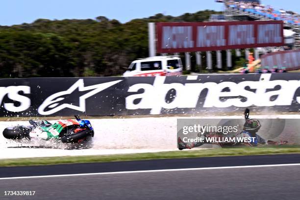 Honda's Spanish rider Alex Rins slides off the track during the first free practice session of the MotoGP Australian Grand Prix at Phillip Island on...