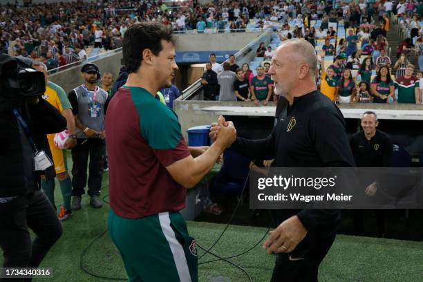 Fernando Diniz coach of Fluminense shakes hands with Mano Menezes coach of Corinthians prior the match between Fluminense and Corinthians as part of...
