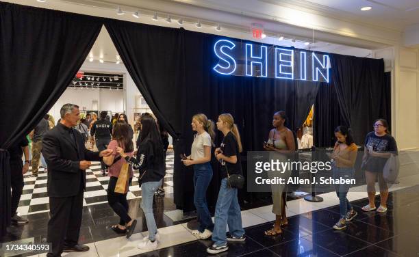 Ontario, CA A line of shoppers get the first opportunity to shop on the opening day of fast fashion e-commerce giant Shein, which is hosting a...