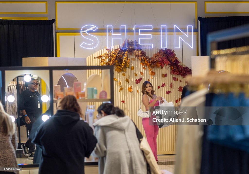 Shoppers line up to shop on the opening day of fast fashion e-commerce giant Shein, which is hosting a brick-and-mortar pop up inside Forever 21 at Ontario Mills mall