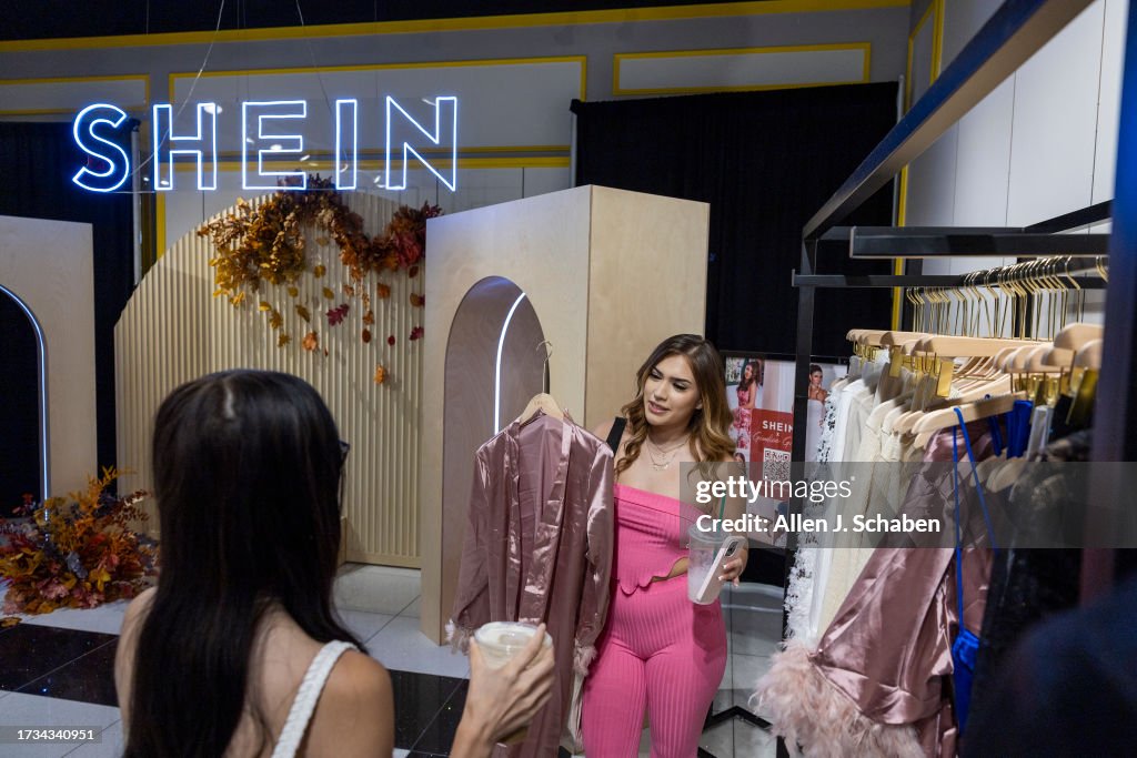 Shoppers line up to shop on the opening day of fast fashion e-commerce giant Shein, which is hosting a brick-and-mortar pop up inside Forever 21 at Ontario Mills mall