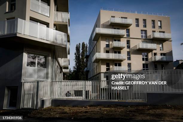 This picture taken on October 18, 2023 shows new buildings of the "Chene Pointu" council estate in Clichy-sous-Bois, a commune in the eastern suburbs...