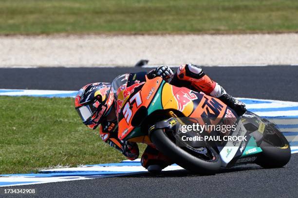 Red Bull KTM Ajo's Spanish rider Pedro Acosta rides his motorcycle during the Moto2 class second free practice session of the MotoGP Australian Grand...