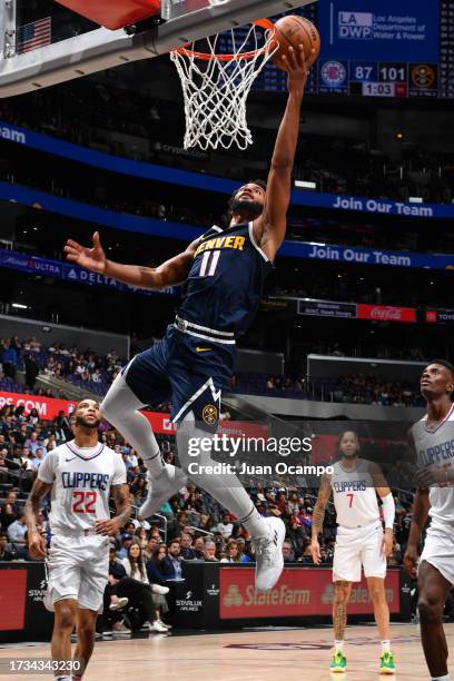 Braxton Key of the Denver Nuggets shoots the ball during the preseason game on October 19, 2023 at Crypto.Com Arena in Los Angeles, California. NOTE...