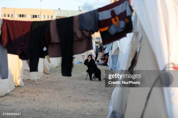 Tents for Palestinians seeking refuge are set up on the grounds of a United Nations Relief and Works Agency for Palestine Refugees centre in Khan...