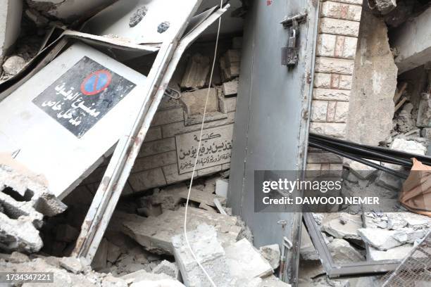 Debris and rubble litter the ground a day after the Greek Orthodox Saint Porphyrius Church, the oldest church still in use in Gaza, was damaged in a...