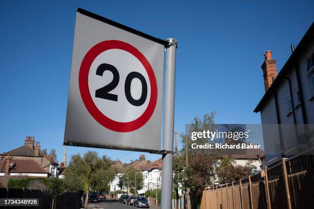 20mph speed limit sign is seen on a residential street in Herne Hill, Lambeth, on 20th October 2023, in London, England.