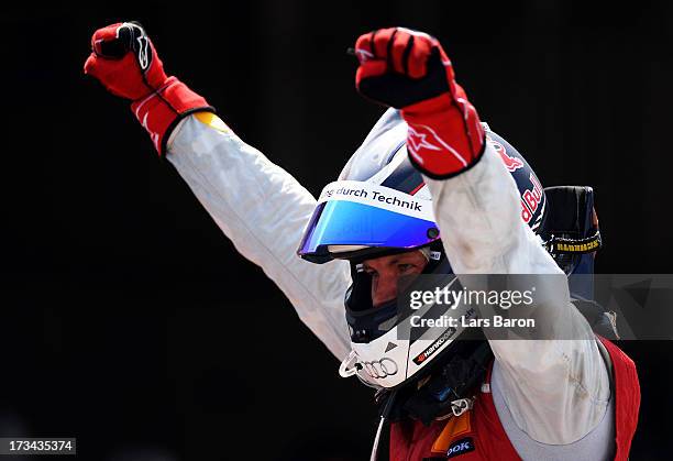 Mattias Ekstroem of Sweden and Audi Sport Team Abt Sportsline celebrates after winning the fifth round of the DTM 2013 German Touring Car...