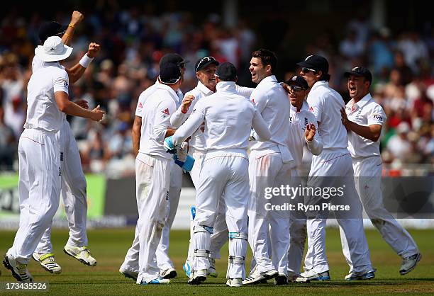 James Anderson of England celebrates after taking the wicket of Brad Haddin of Australia to claim victory during day five of the 1st Investec Ashes...