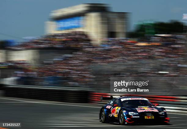 Mattias Ekstroem of Sweden and Audi Sport Team Abt Sportsline drives during the fifth round of the DTM 2013 German Touring Car Championship at...