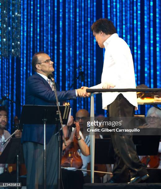 Joe Torre and Alan Gilbert, Music Director of the New York Philharmonic on stage during 2013 Major League Baseball All-Star Charity Concert starring...