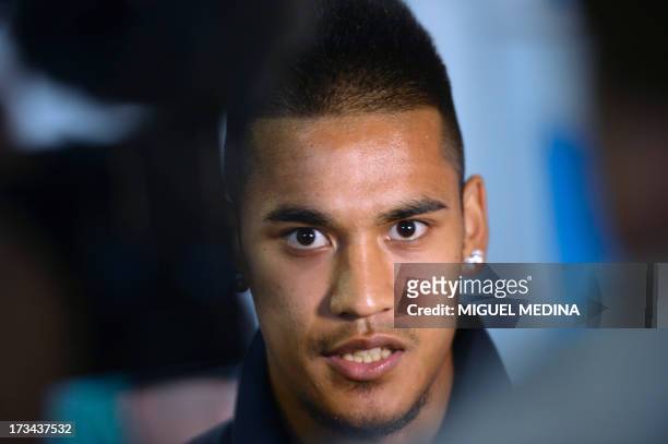 Under-20 French team goalkeeper Alphonse Areola arrives with his teammates at the Roissy-Charles-de-Gaulle airport, on July 14 a day after defeating...