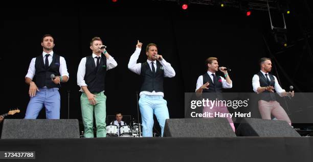 The Overtones perform on stage at Magic Summer Live Festival 2013 at Stoke Park on July 14, 2013 in Guildford, England.