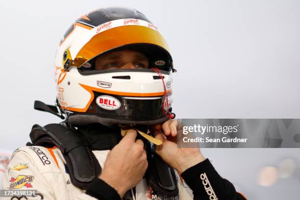 Parker Kligerman, driver of the Spiked Light Coolers Chevrolet, prepares to qualify for the NASCAR Xfinity Series Alsco Uniforms 302 at Las Vegas...