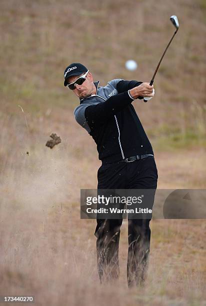 Henrik Stenson of Sweden hits his 2nd shot on the 6th hole during the final round of the Aberdeen Asset Management Scottish Open at Castle Stuart...